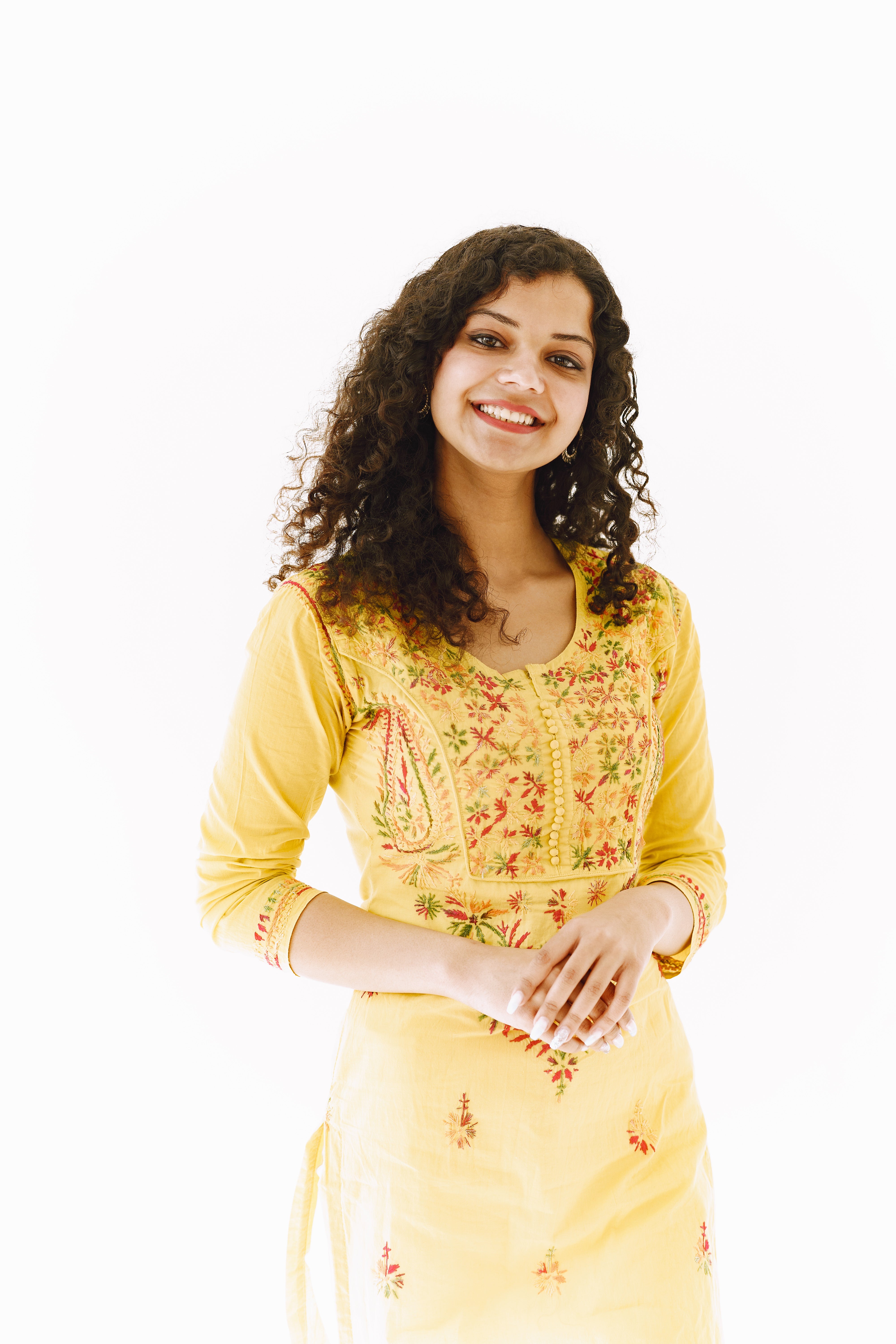 files/cheerful-traditional-indian-woman-white-background-studio-shot.jpg